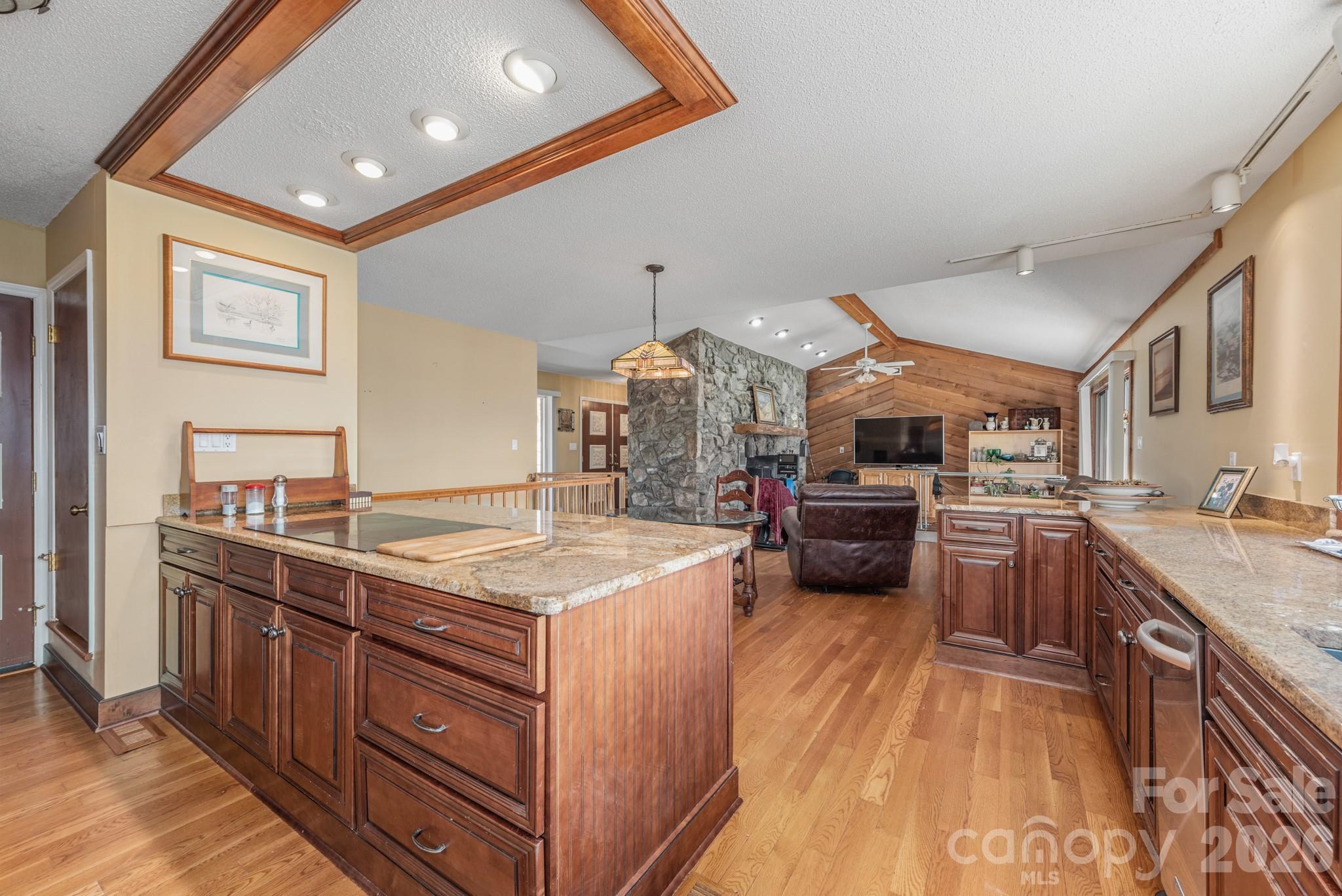 Kitchen island with open living room - 151 Bridlewood Drive, Mooresville