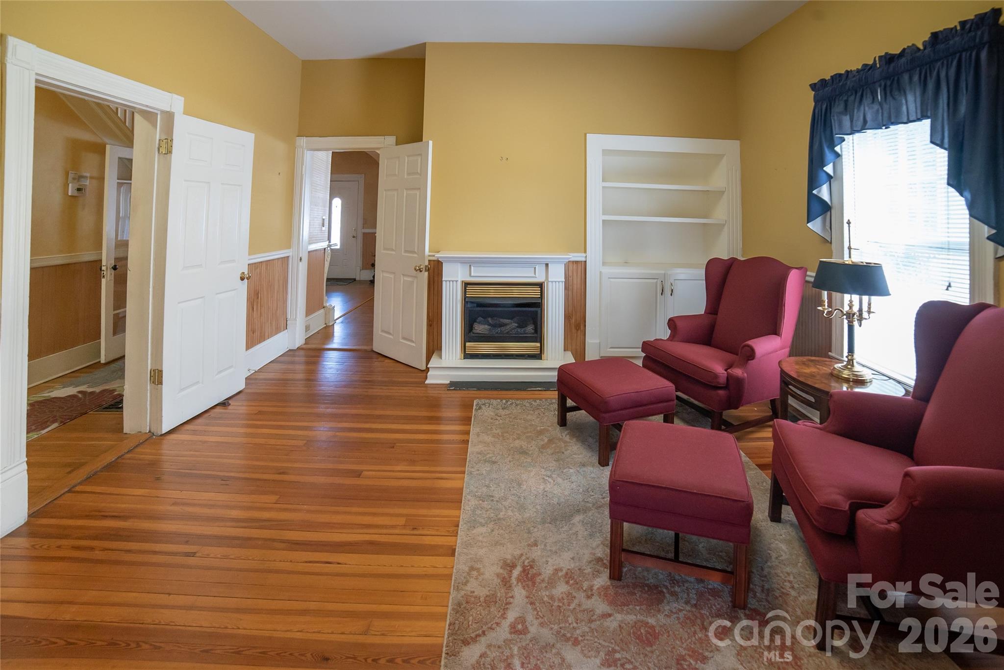 Main level, rear office with gas fireplace. - 508 Mulberry Street SW, Lenoir