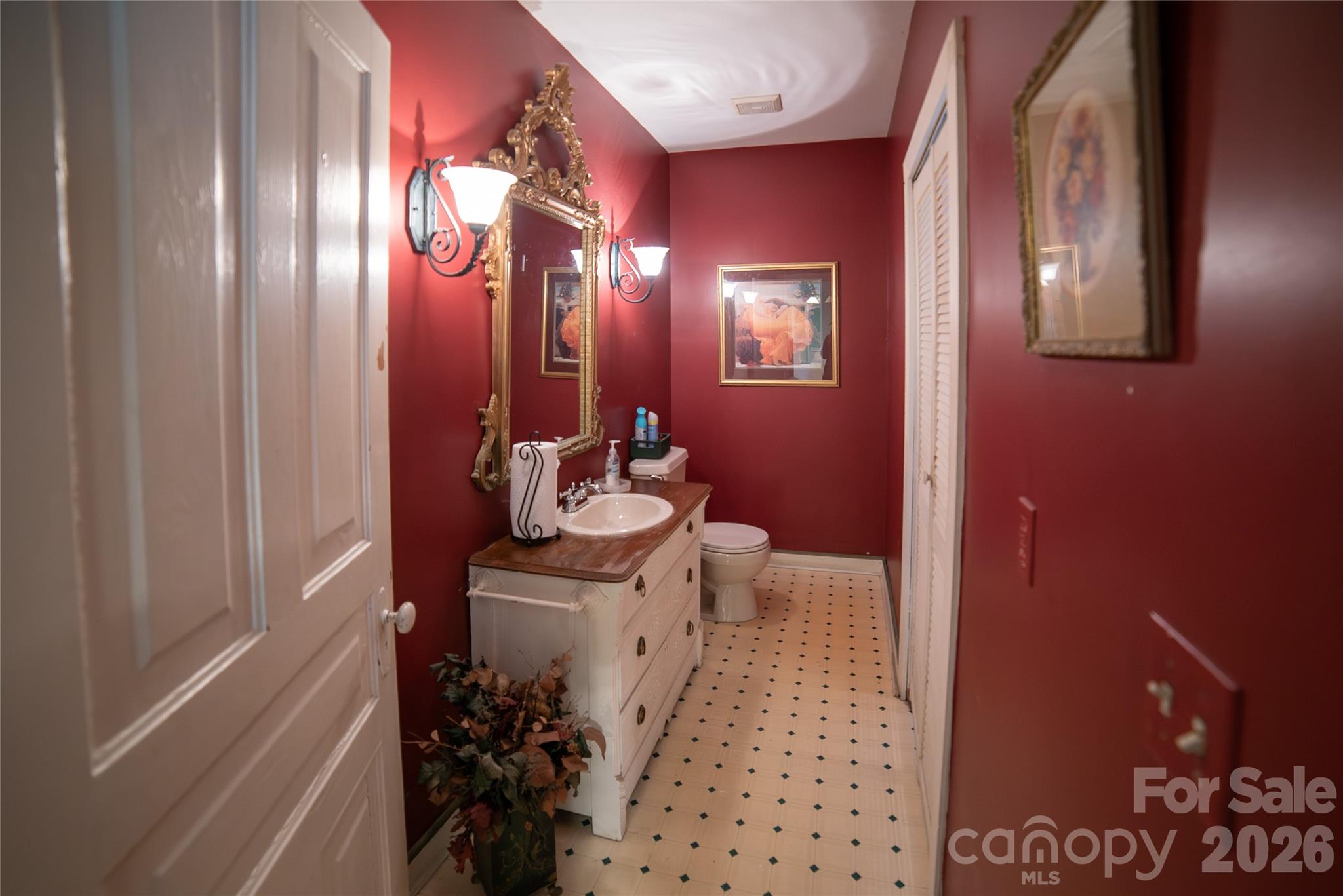 Main level bath, laundry room to right. - 508 Mulberry Street SW, Lenoir