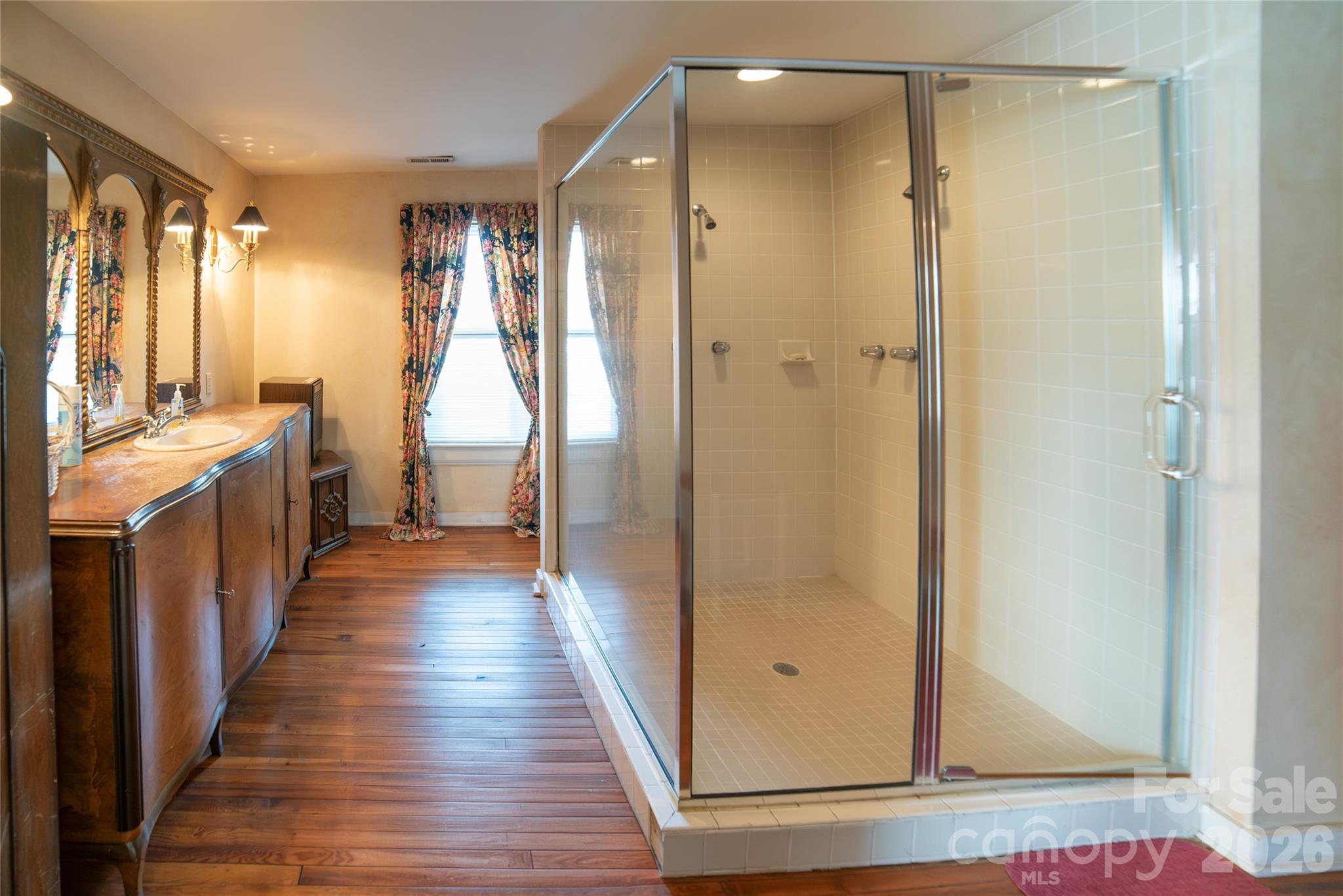Upstairs full bath with vintage vanity and oversized walk-in shower. - 508 Mulberry Street SW, Lenoir