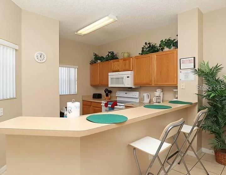 Townhouse at 8550 CRYSTAL COVE LOOP, KISSIMMEE, photo 9 of 27