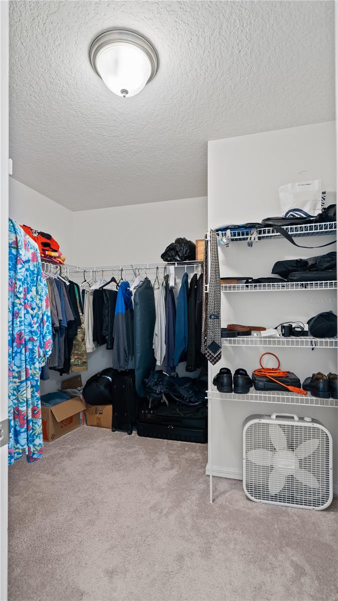 Primary Walk in closet - 8113 RED STOPPER LN, WINTER GARDEN