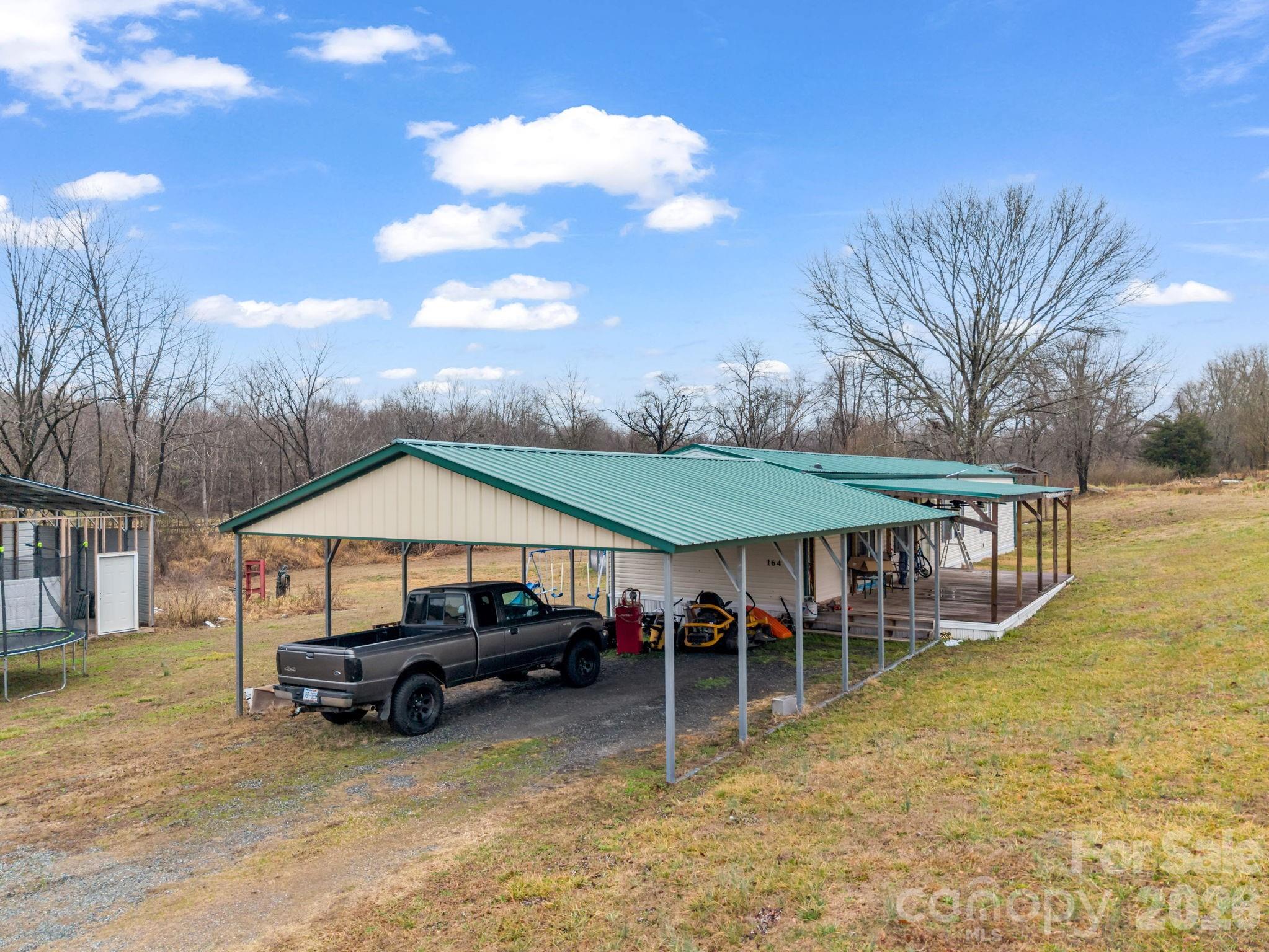 Single Family Residence at 827 Old Henrietta Road, Forest City, photo 8 of 24