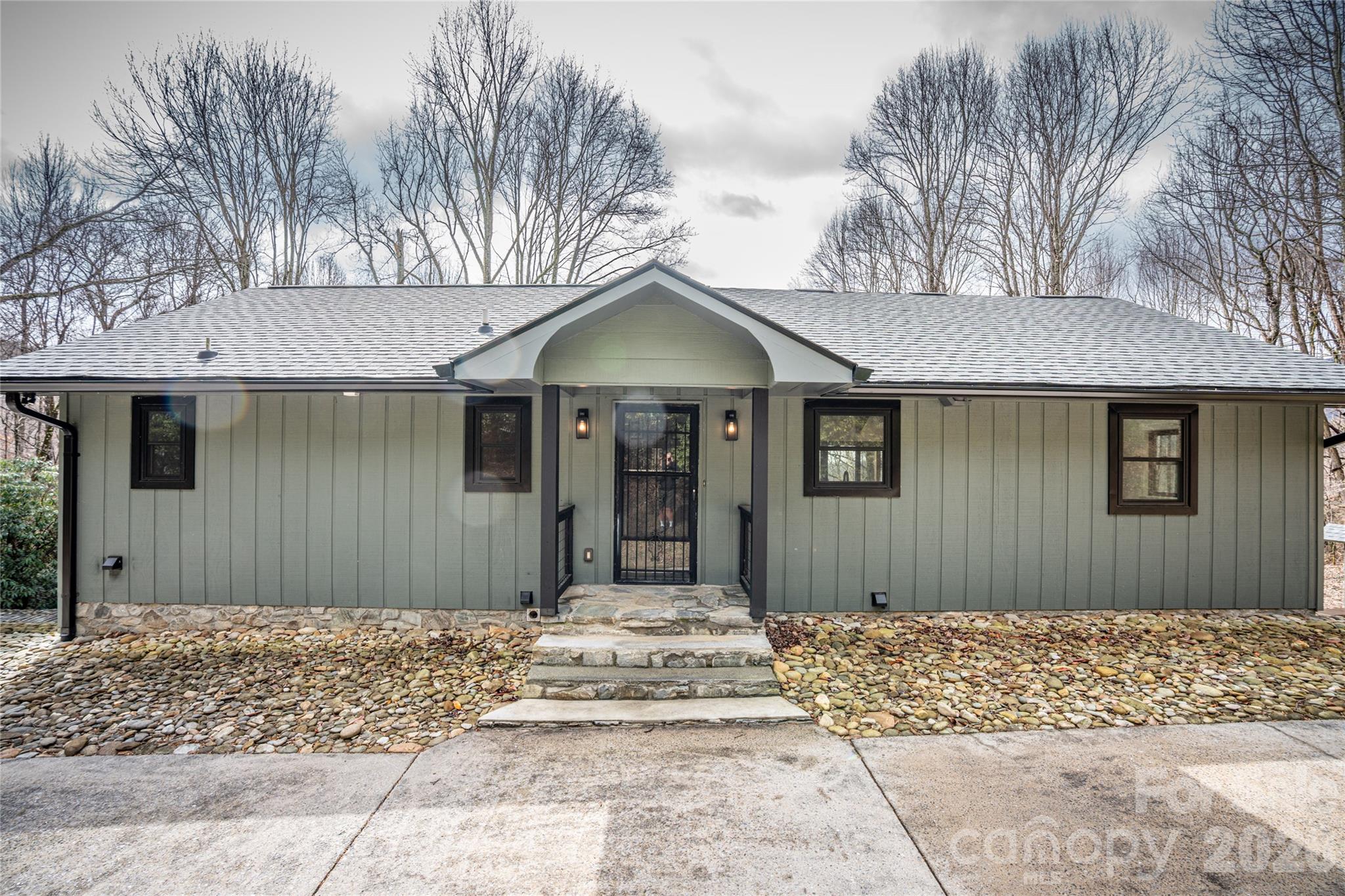 Fresh exterior paint and updated finishes throughout. - 453 Friendly Acres Drive, Waynesville