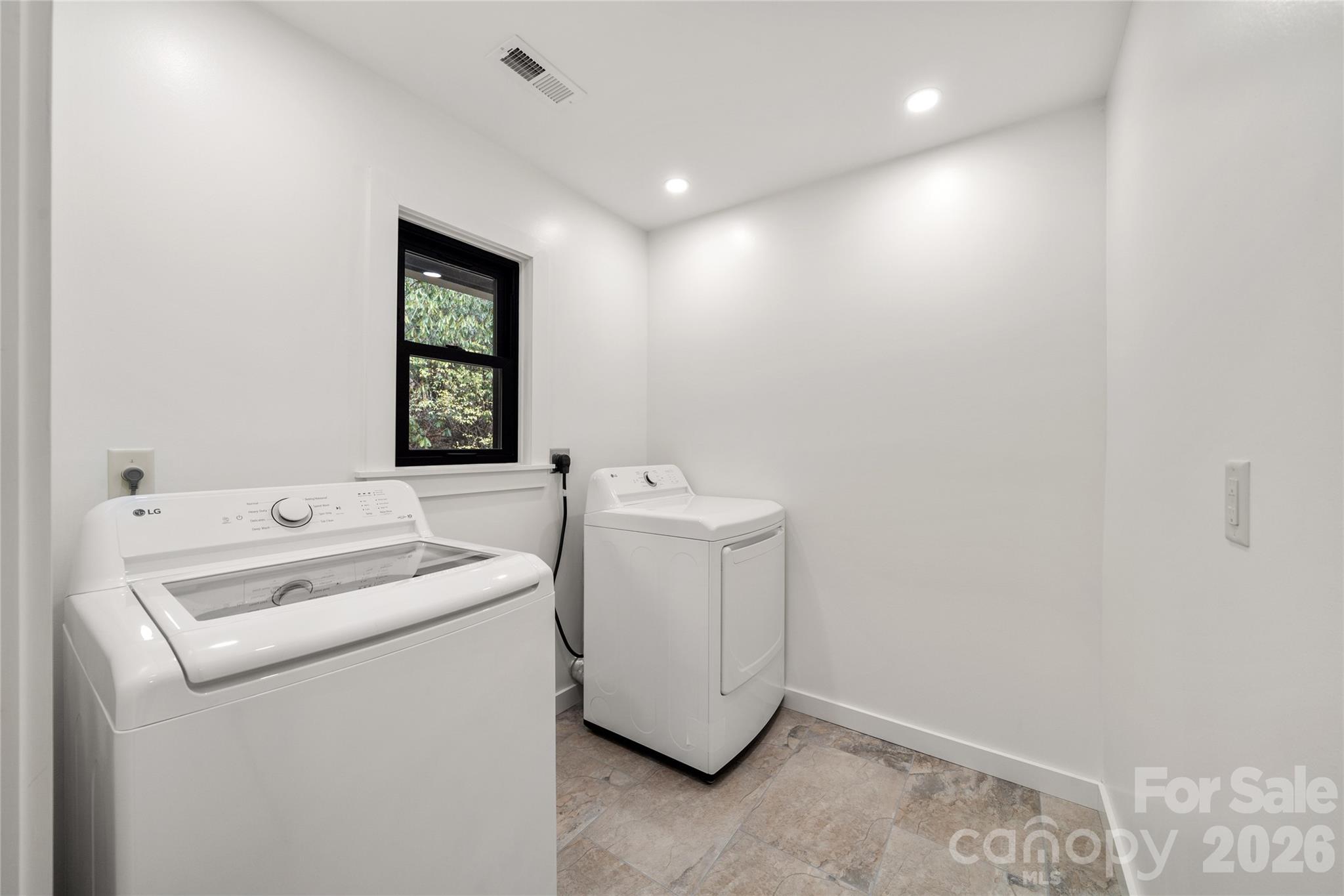 Washer and dryer convey - 453 Friendly Acres Drive, Waynesville