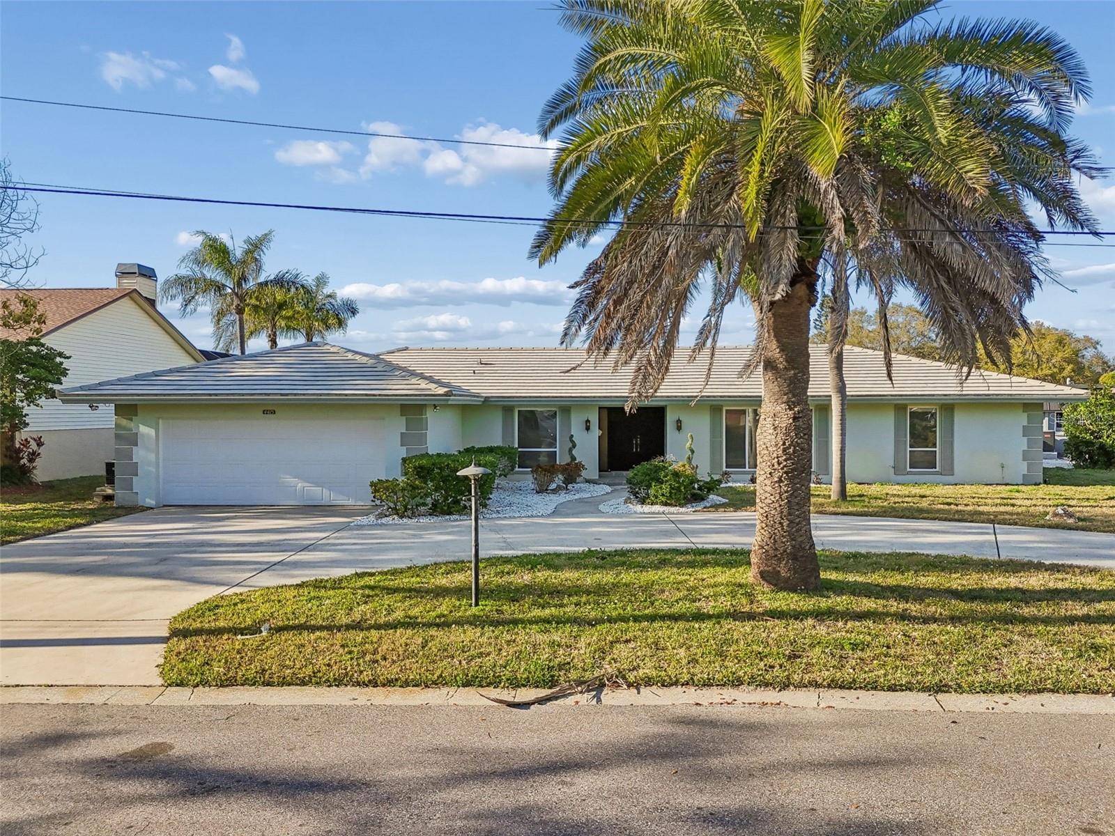 BOATERS BLISS in Harbor Hills Subdivision...on a canal just south of Clearwater in the Belleair Bluffs area. - 4415 CLEARWATER HARBOR DR N, LARGO