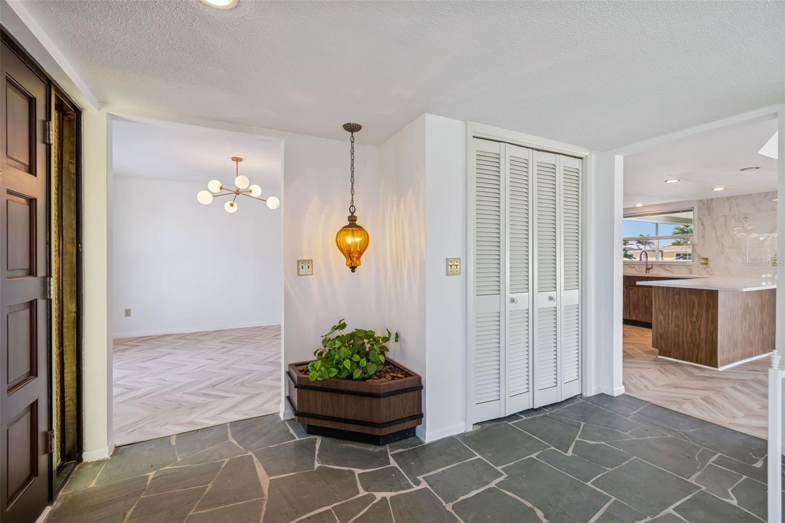 This home still has vibes of the 1960's...retro decor mixed with Mid Century Modern would make this home a standout! - 4415 CLEARWATER HARBOR DR N, LARGO