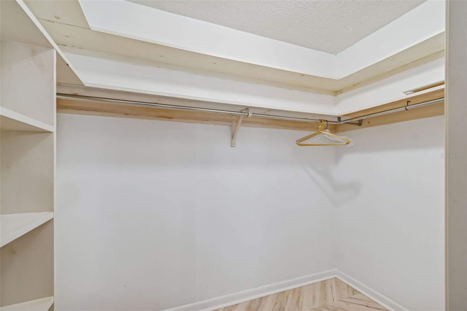 generous walk-in closet in primary bath - 4415 CLEARWATER HARBOR DR N, LARGO
