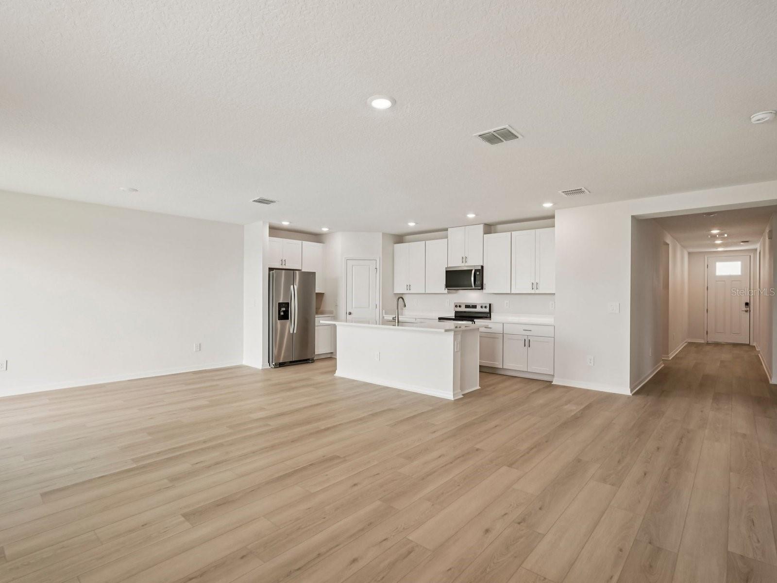 Interior photos are not of the actual home but are photos of the builder home with the same floorplan with similar interior finishes and features. - 10417 ABUNDANCE GROVE WAY, PARRISH