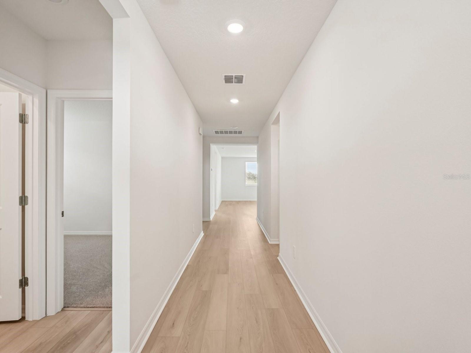 Interior photos are not of the actual home but are photos of the builder home with the same floorplan with similar interior finishes and features. - 10417 ABUNDANCE GROVE WAY, PARRISH