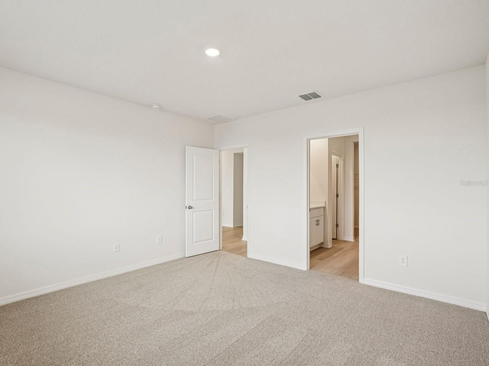 Interior photos are not of the actual home but are photos of the builder home with the same floorplan with similar interior finishes and features. - 10417 ABUNDANCE GROVE WAY, PARRISH
