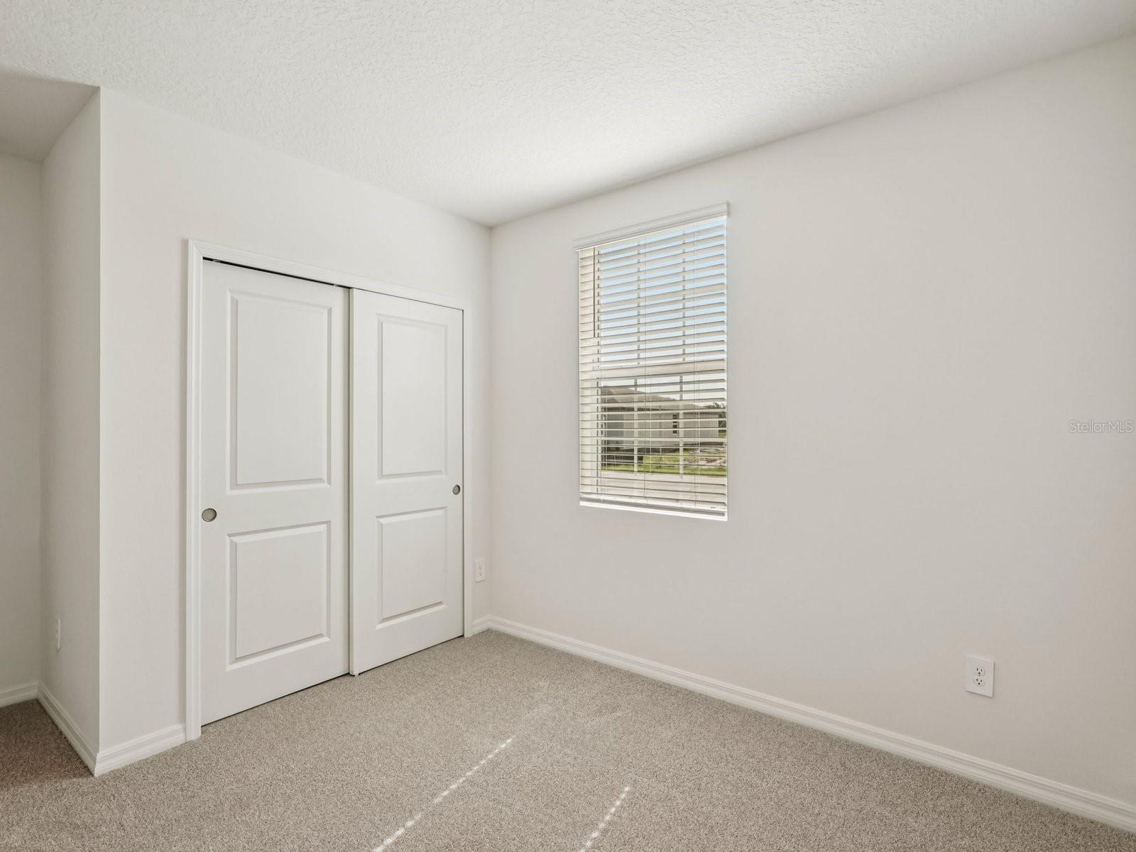 Interior photos are not of the actual home but are photos of the builder home with the same floorplan with similar interior finishes and features. - 10432 ABUNDANCE GROVE WAY, PARRISH
