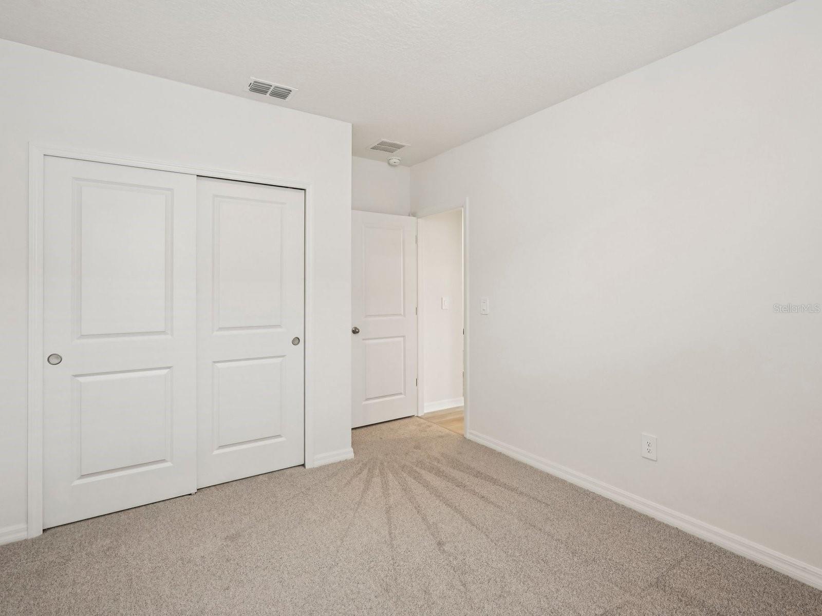 Interior photos are not of the actual home but are photos of the builder home with the same floorplan with similar interior finishes and features. - 10432 ABUNDANCE GROVE WAY, PARRISH