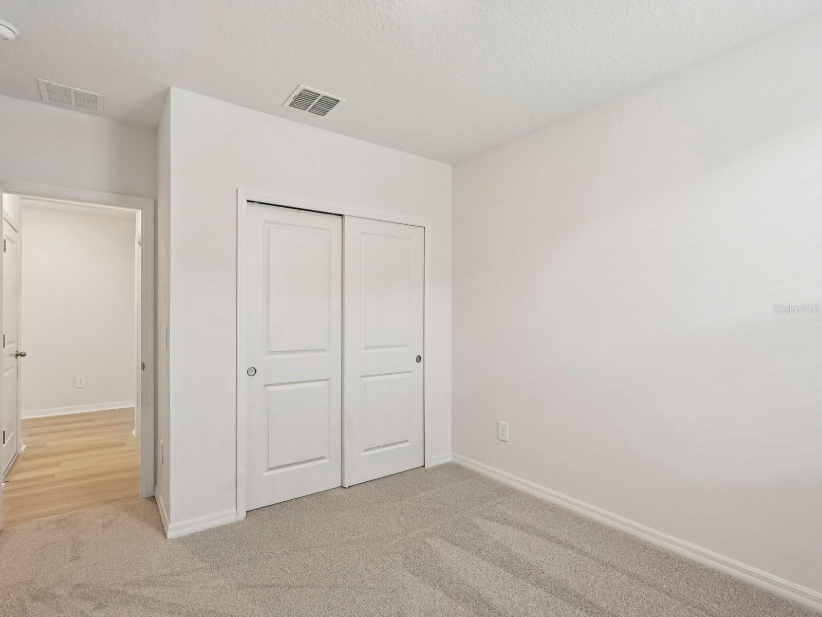 Interior photos are not of the actual home but are photos of the builder home with the same floorplan with similar interior finishes and features. - 10432 ABUNDANCE GROVE WAY, PARRISH