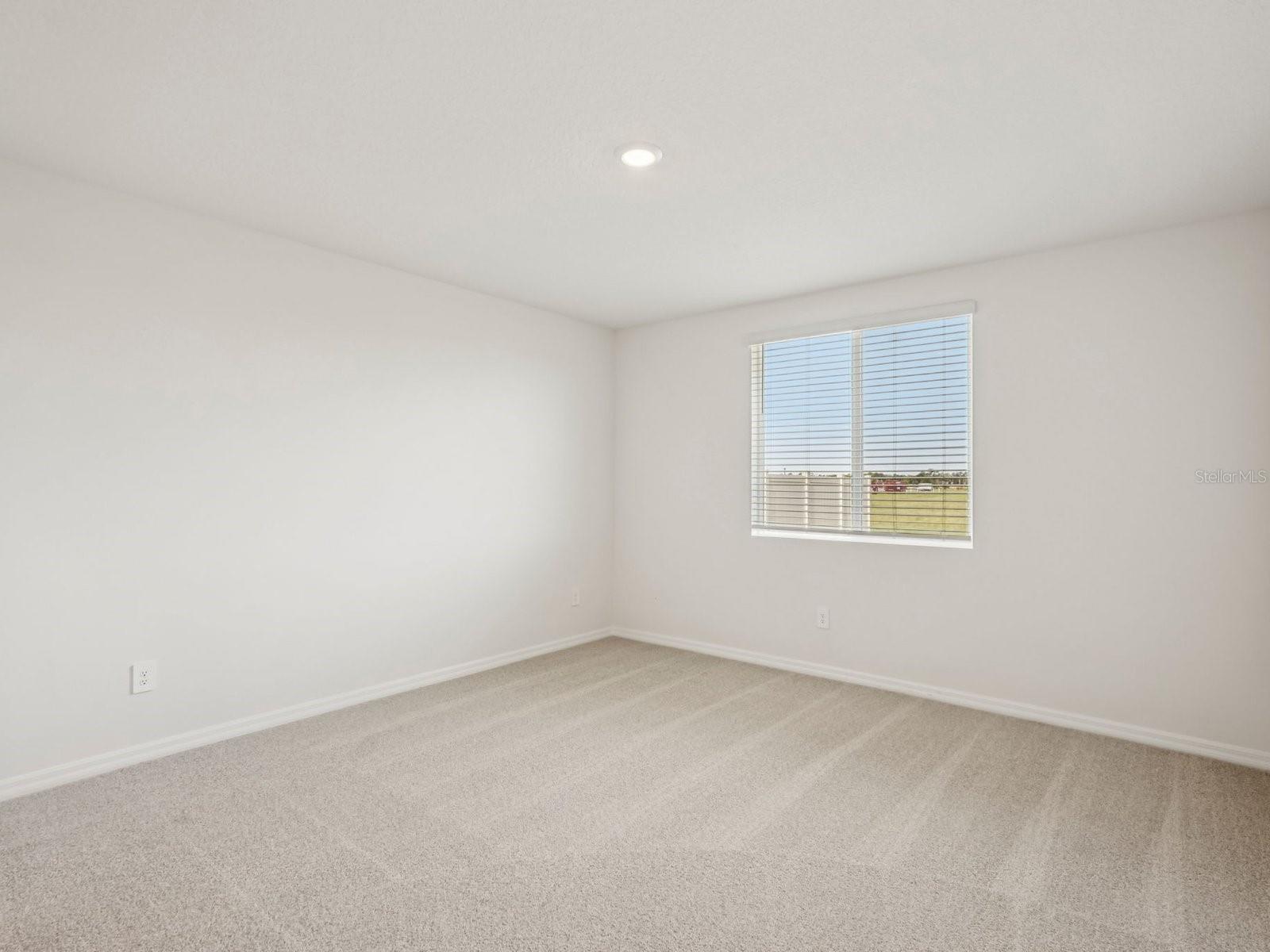 Interior photos are not of the actual home but are photos of the builder home with the same floorplan with similar interior finishes and features. - 10432 ABUNDANCE GROVE WAY, PARRISH
