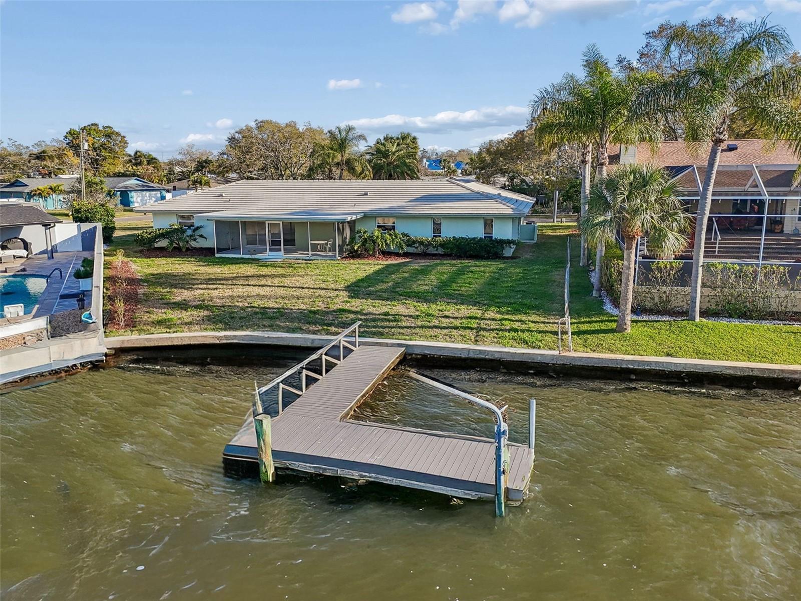 Existing dock...rendering of new dock with 10k lift and estimate available for review - 4415 CLEARWATER HARBOR DR N, LARGO