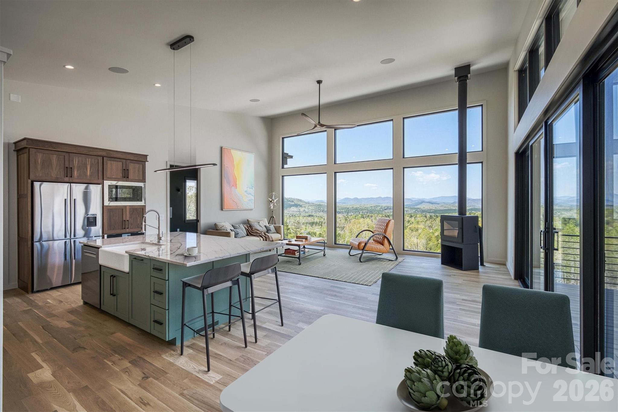 Kitchen/living room with vritual staging - 463 Summit Trail, Nebo