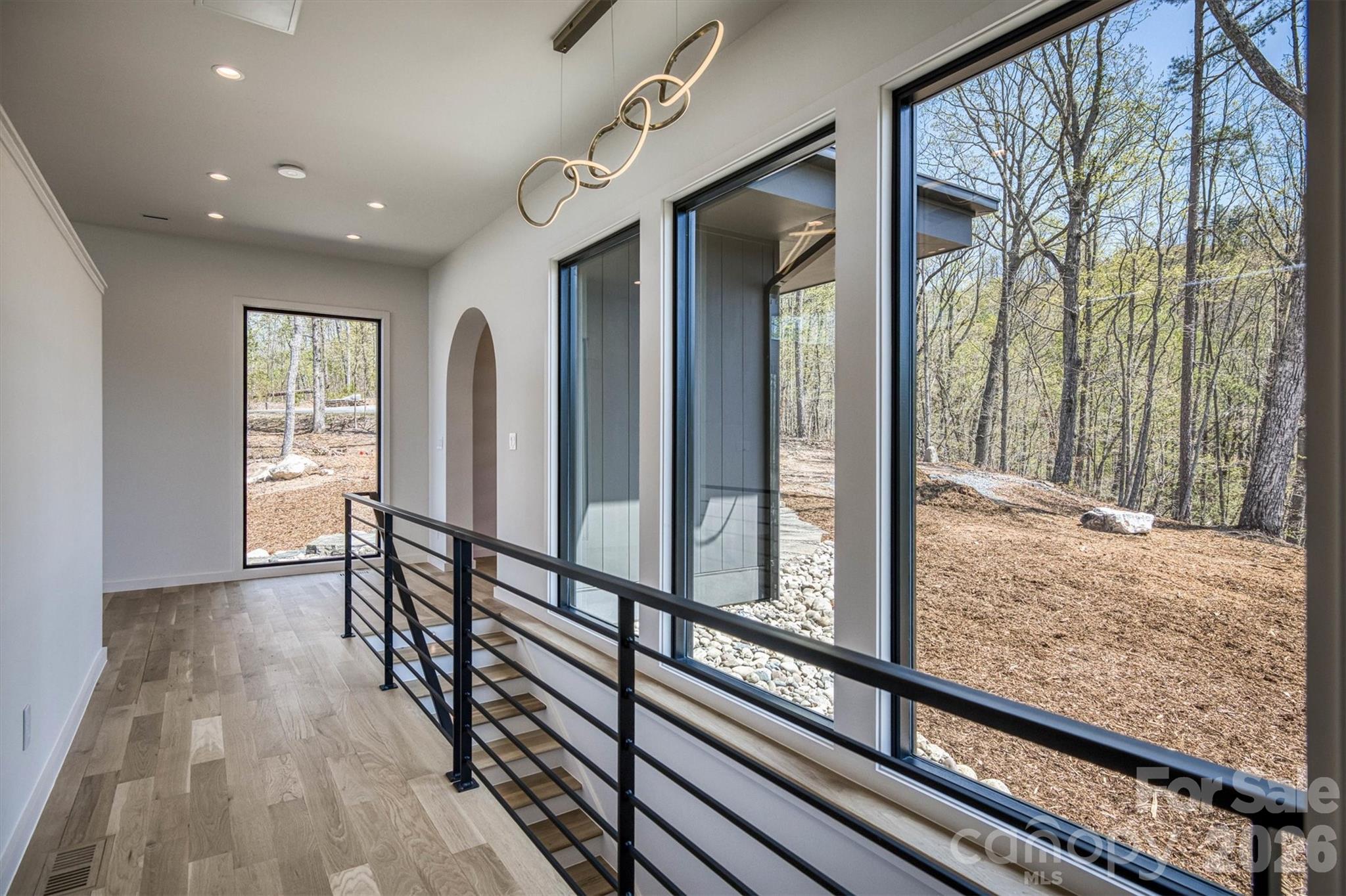 Front hallway to primary bedroom - 463 Summit Trail, Nebo