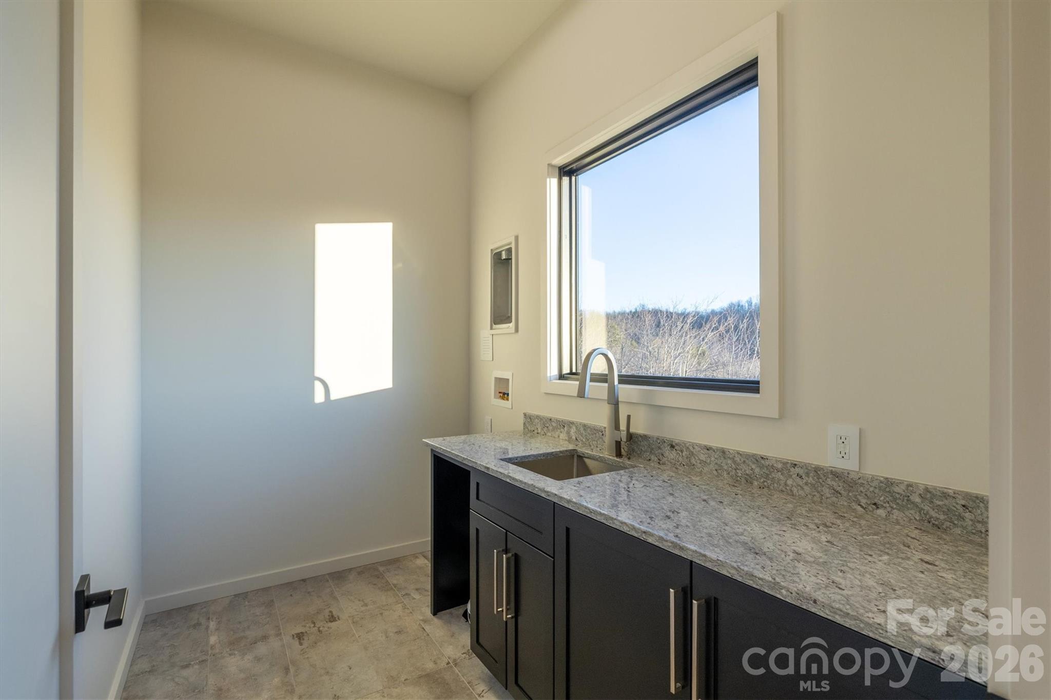 Laundry in lower level - 463 Summit Trail, Nebo