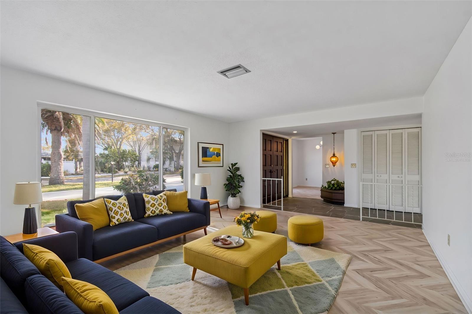This photo is virtually staged. - 4415 CLEARWATER HARBOR DR N, LARGO