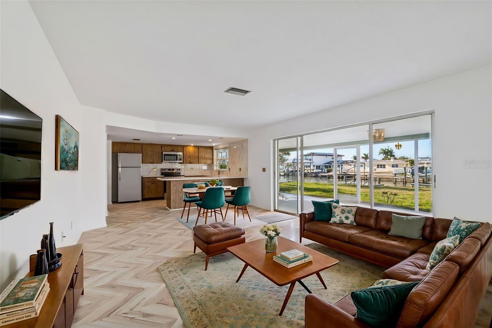 This photo is virtually staged. - 4415 CLEARWATER HARBOR DR N, LARGO