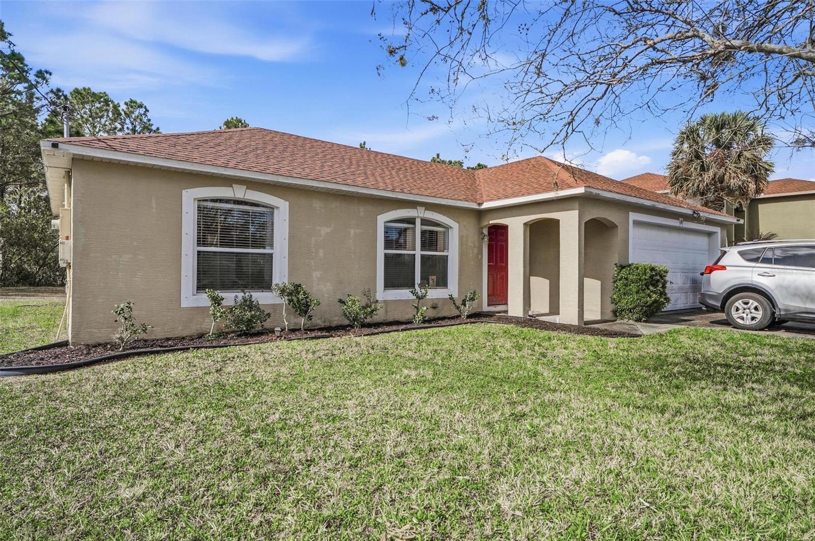 Front - 69 LONDON DR, PALM COAST