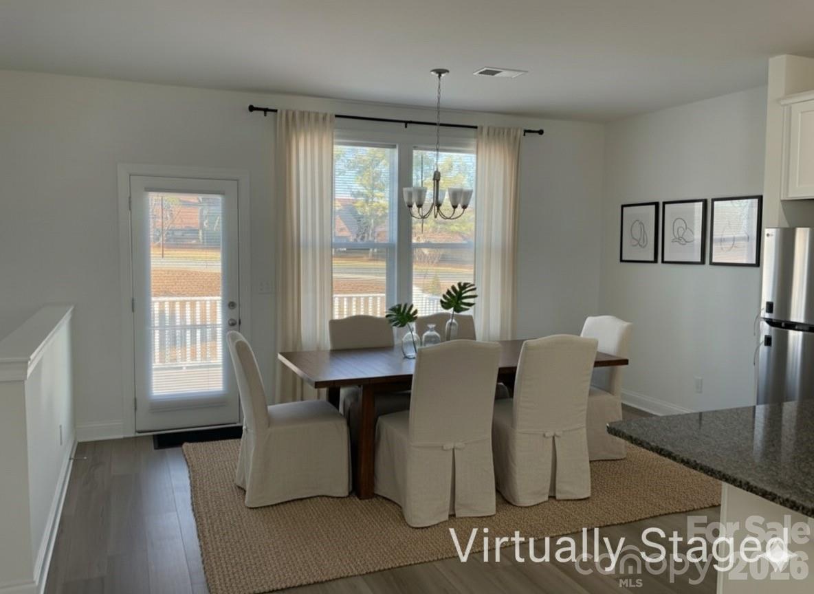 Virtually staged dining area - 9240 Walnut Hill Road NW, Concord
