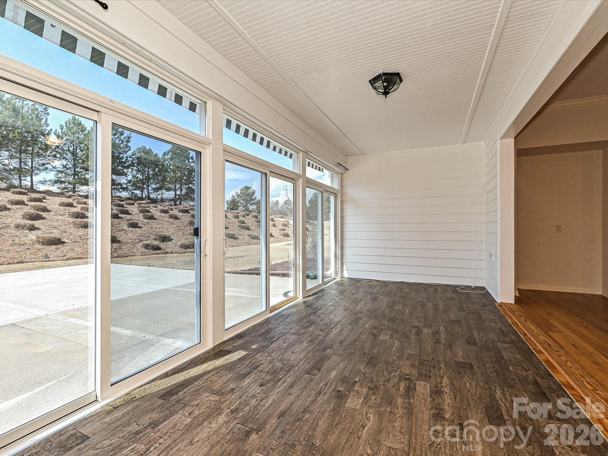 Sunroom with sliding doors & screens - 2004 Rockbrook Lane, Belmont