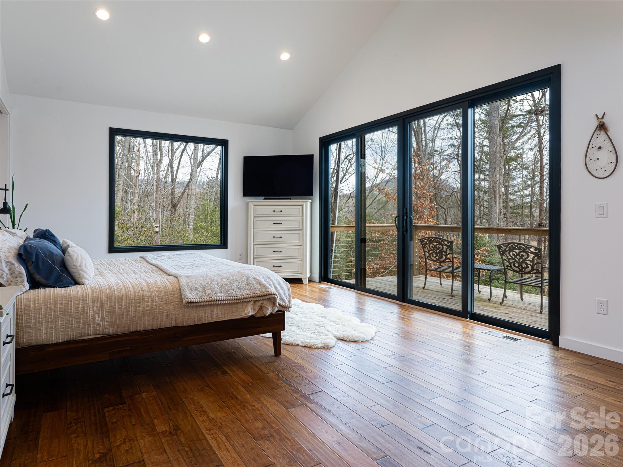 Sliders to the deck from the Owners Suite with mountain views - 508 Avery Creek Road, Arden