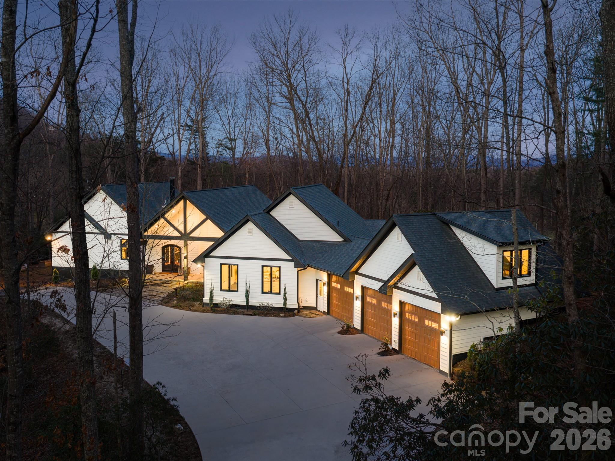 Front view at twilight in the winter - 508 Avery Creek Road, Arden