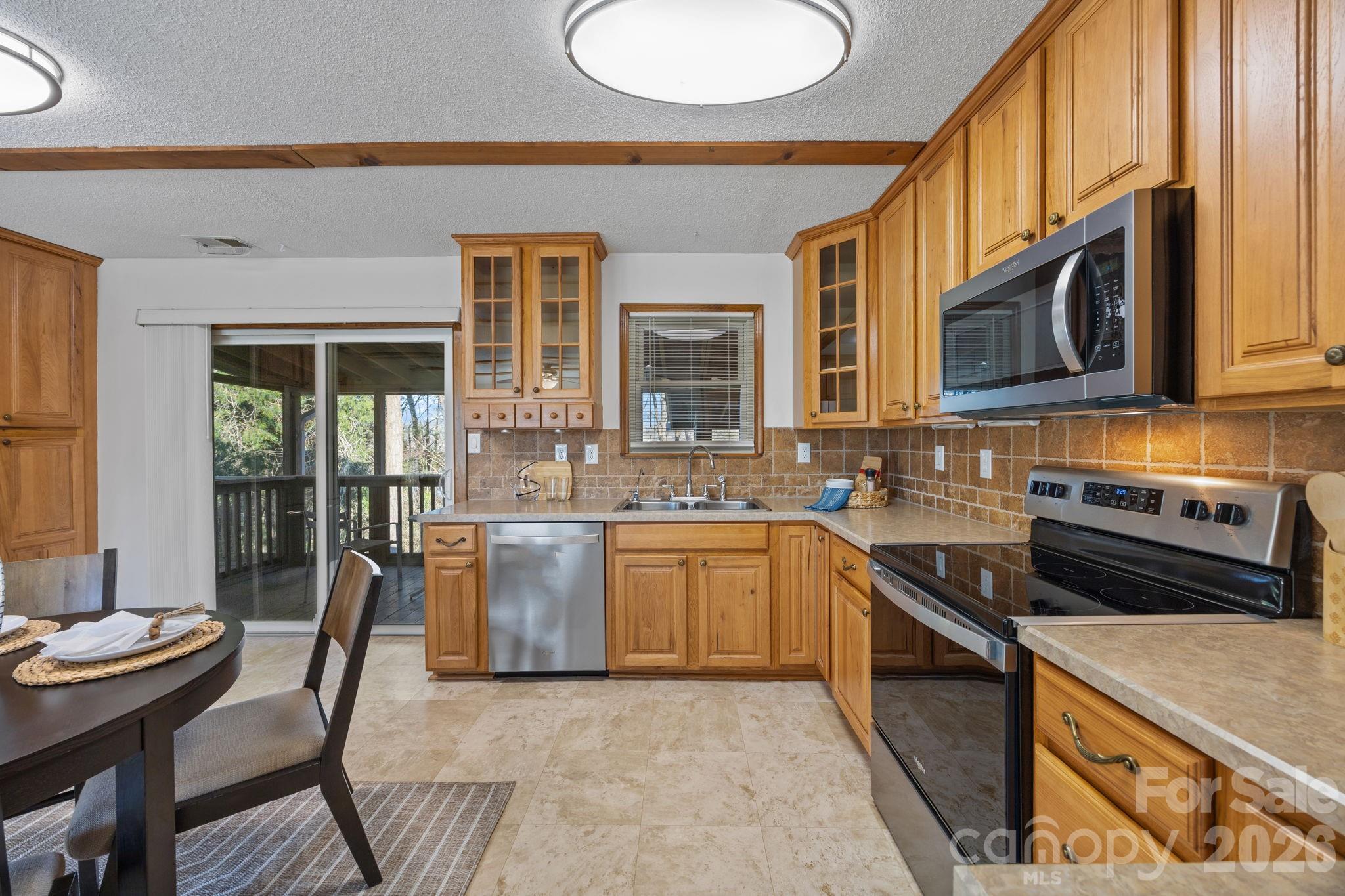 View of the kitchen with updated appliances/frig included - 4278 Harbor Lane, Sherrills Ford