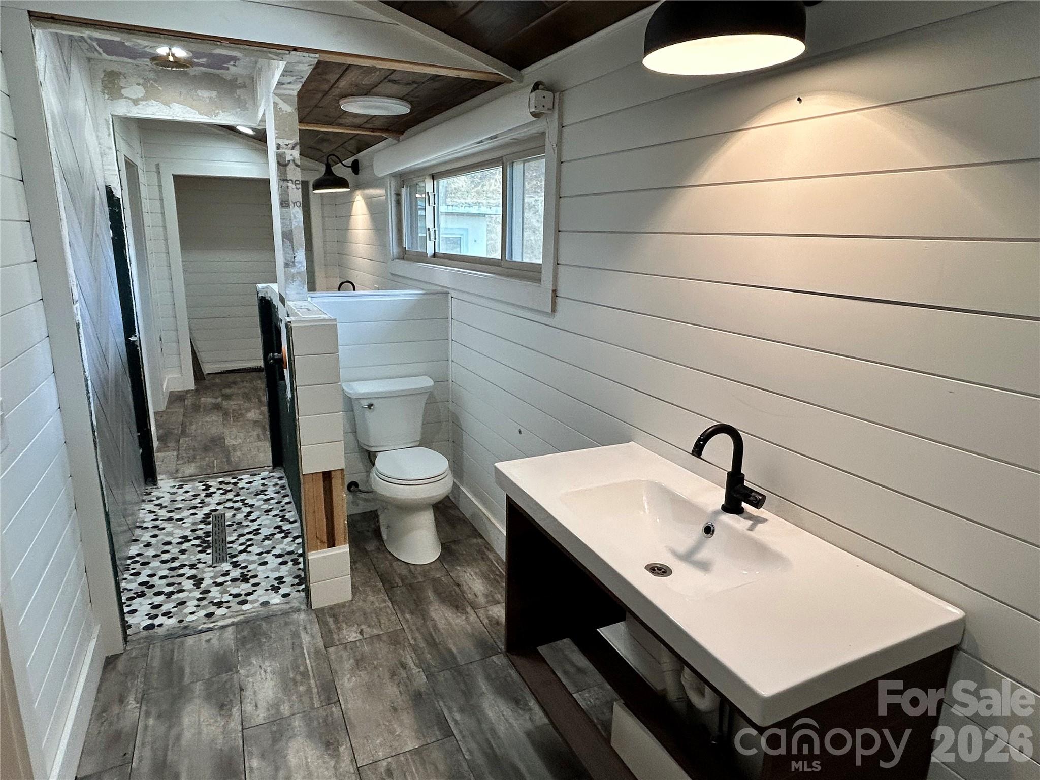 Unfinished shared guest bathrooms - 330 Potts Drive, Waynesville