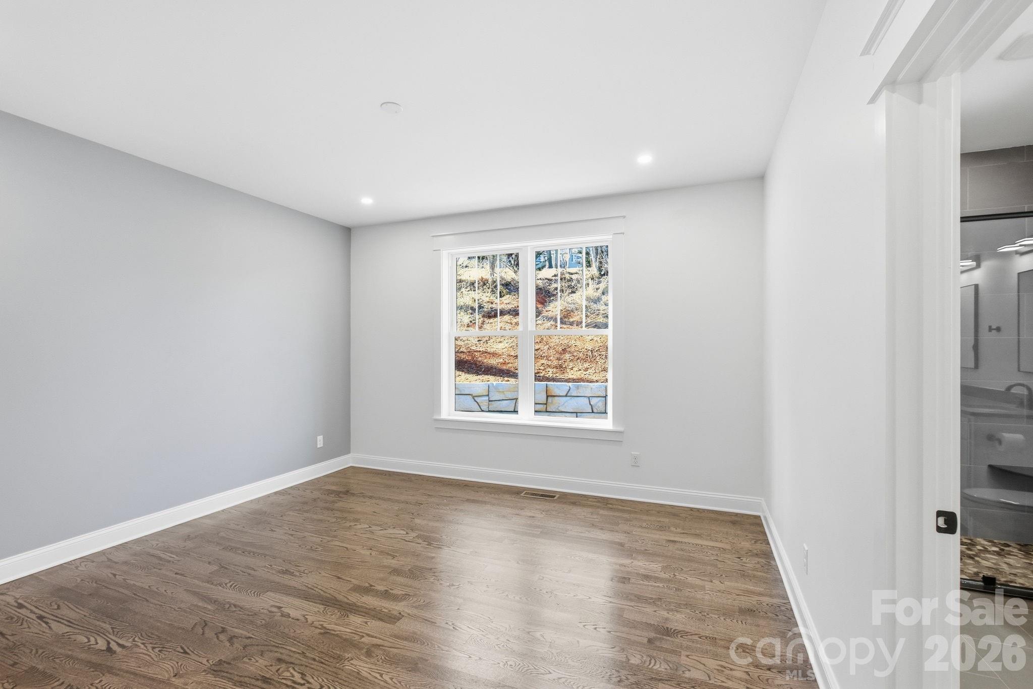 Primary Bedroom on the Main Level - 22 Deep Woods Road, Weaverville