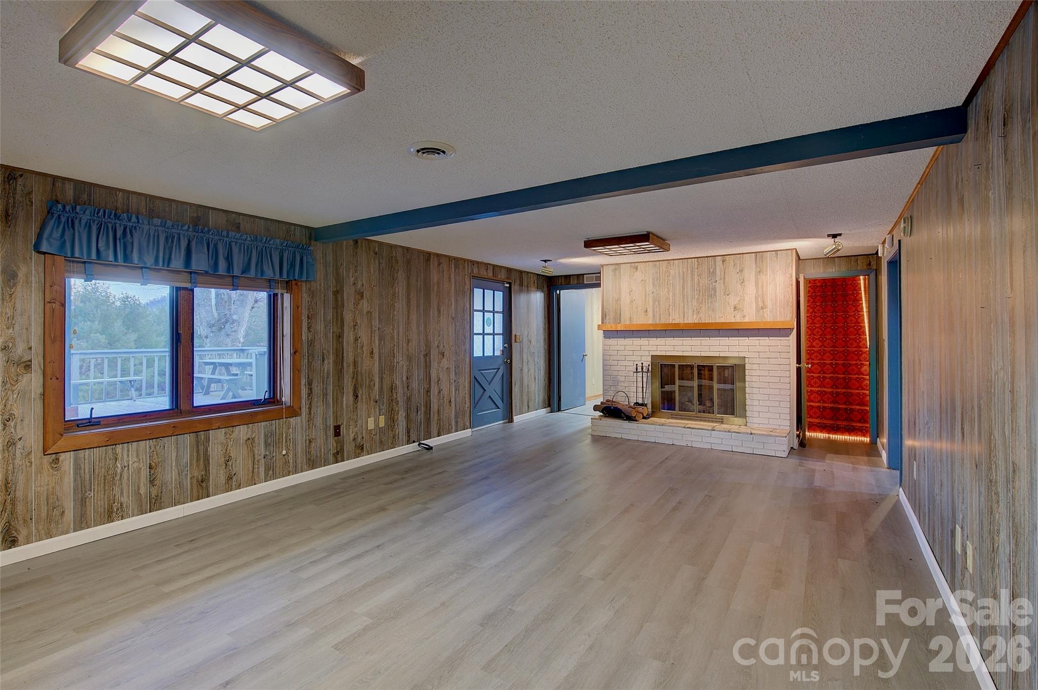 Lower level den - 220 Grand View Lane, Burnsville