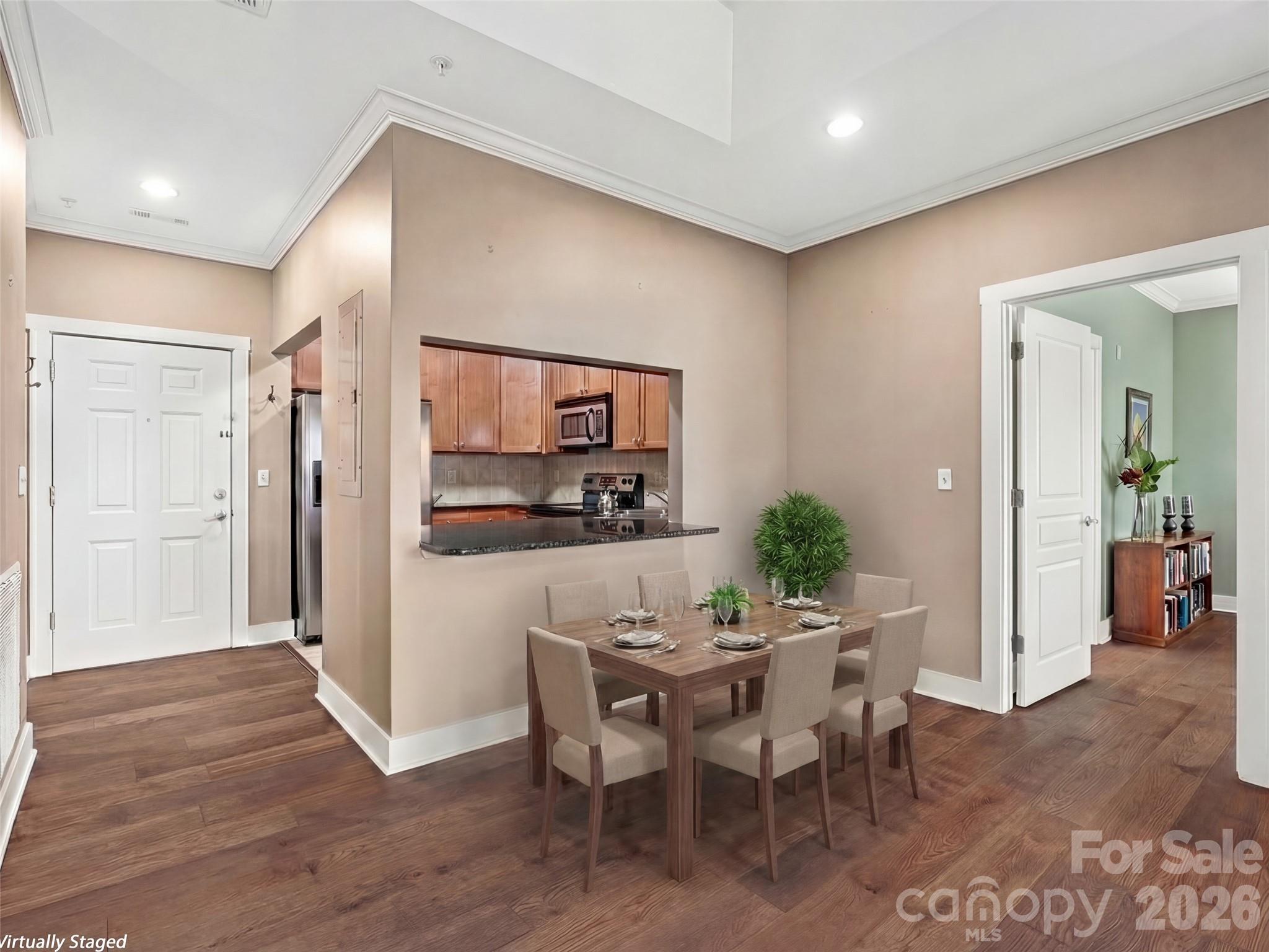 Virtually staged dining area looking towards primary bedroom - 9 Kenilworth Knoll, Asheville
