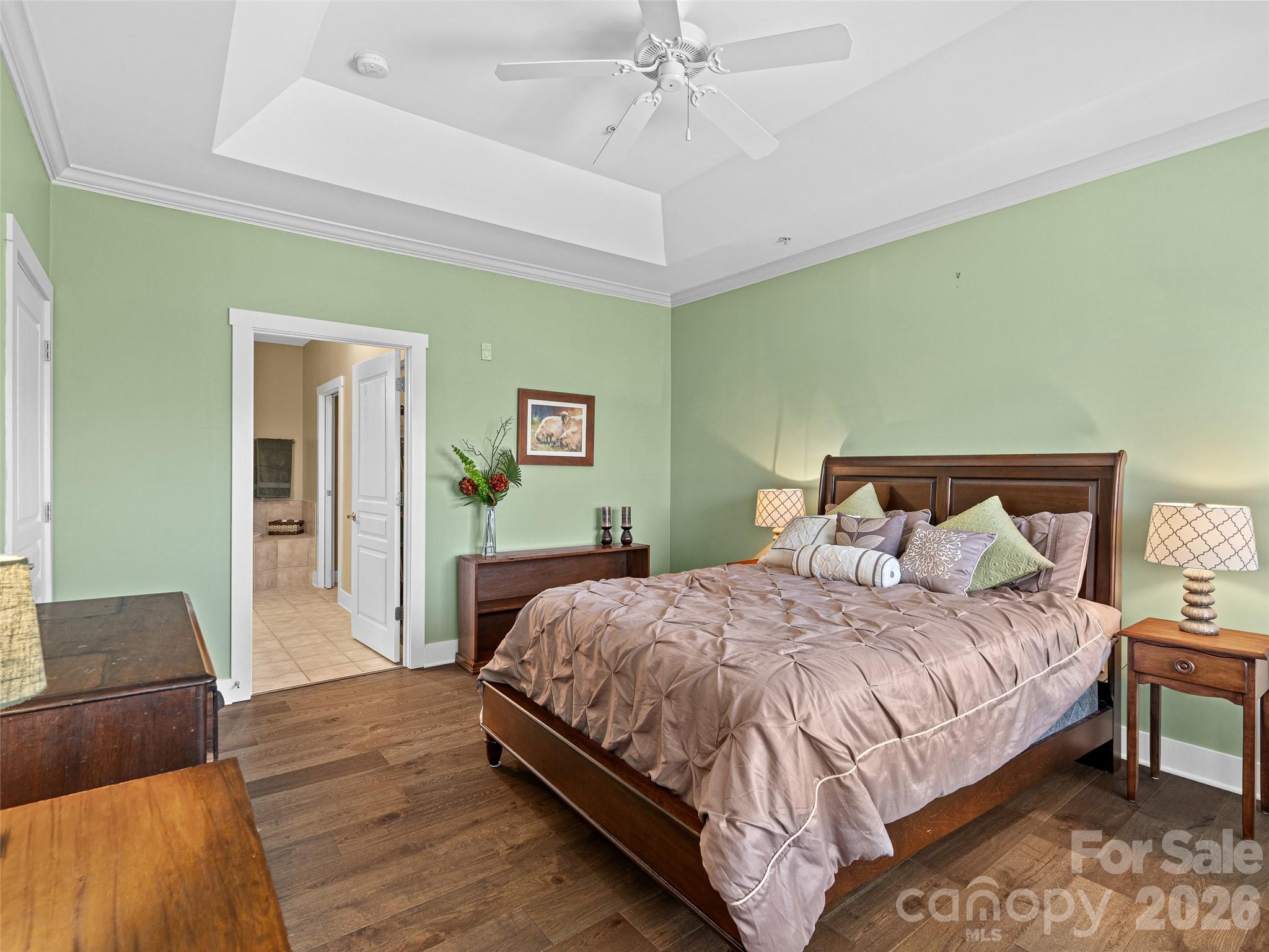 Primary bedroom, tray ceiling, looking into bathroom - 9 Kenilworth Knoll, Asheville