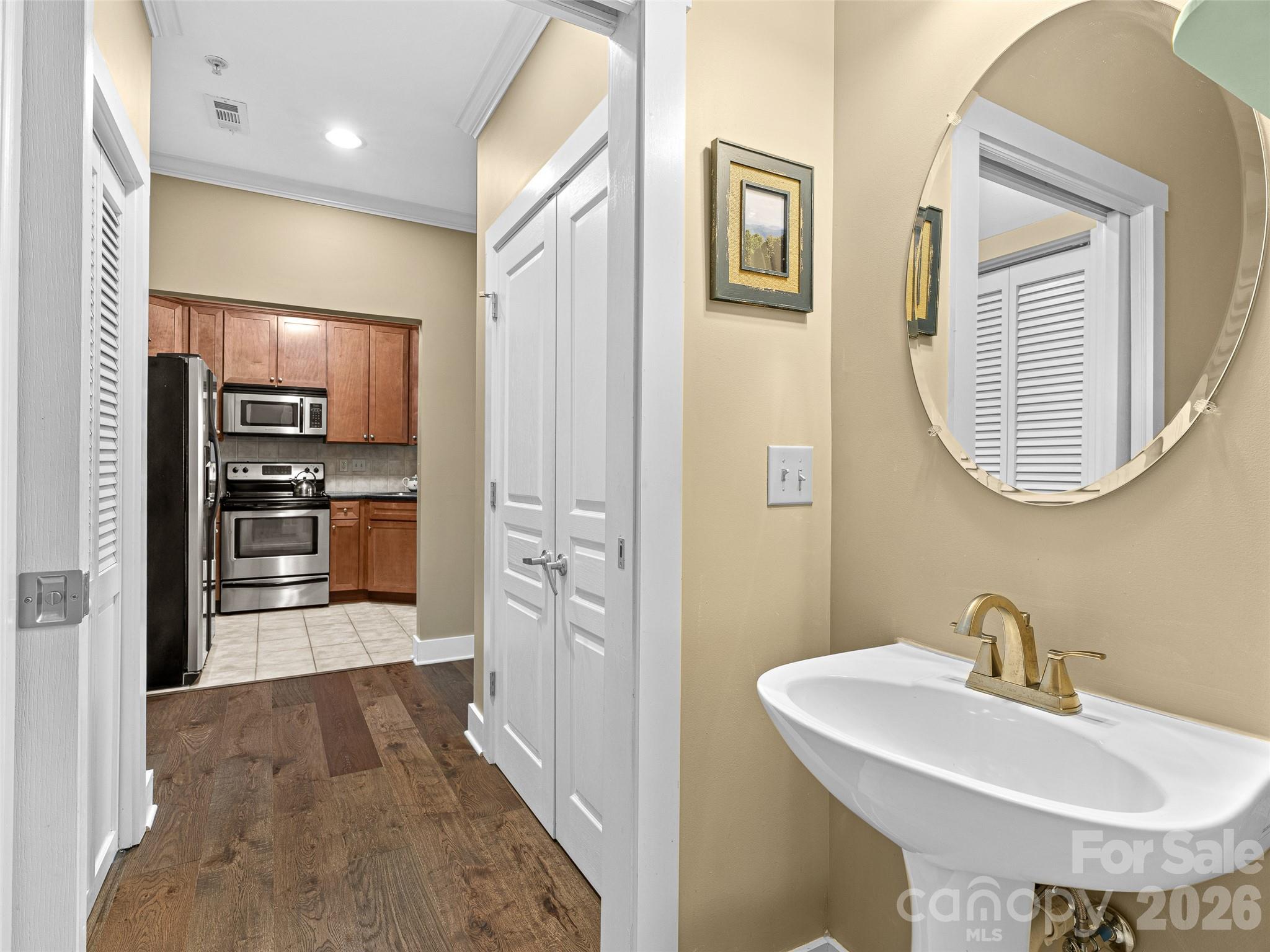 Looking from guest bath across the foyer into kitchen - 9 Kenilworth Knoll, Asheville