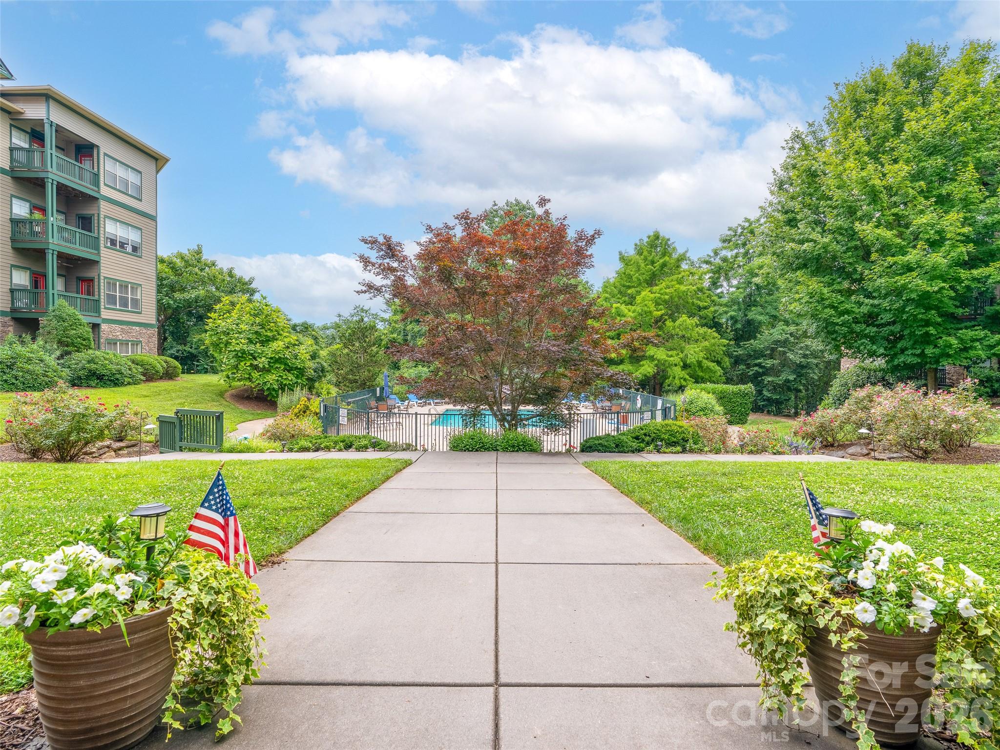 Walkway from lobby to swimming pool - 9 Kenilworth Knoll, Asheville