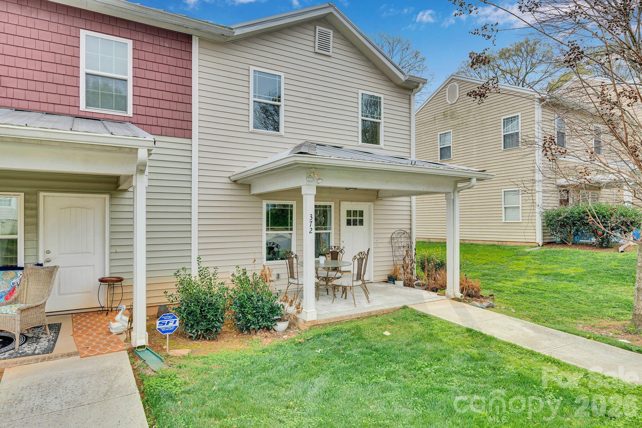 Side view of end unit. - 372 E Mills Avenue, Mooresville