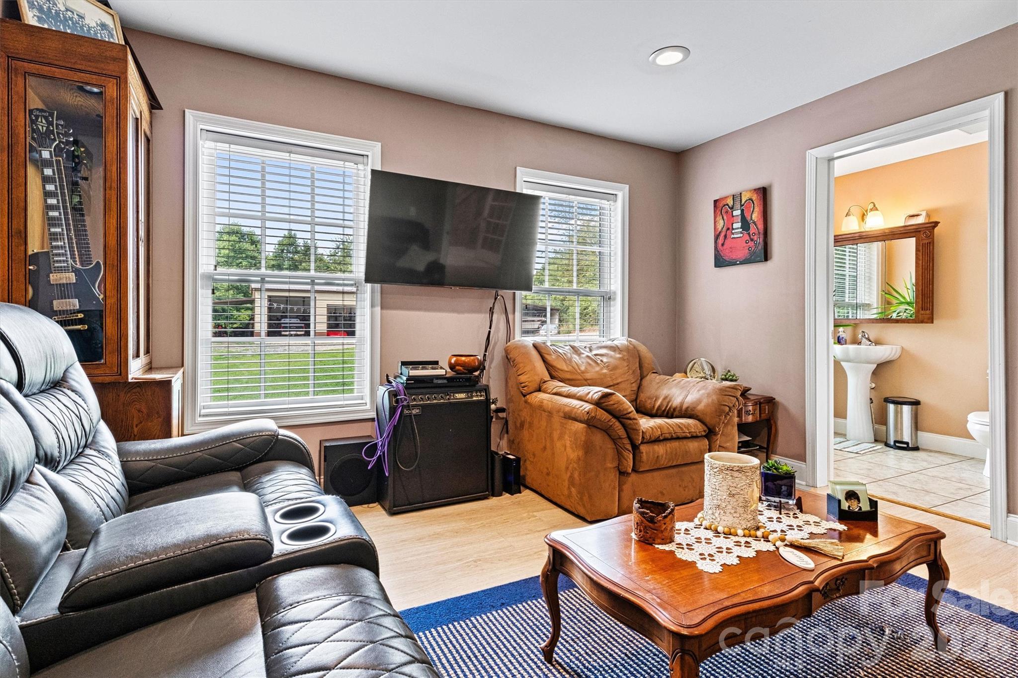 downstairs bedroom - Primary Suite - with ensuite half bath - 6051 Pointe West Lane, Vale
