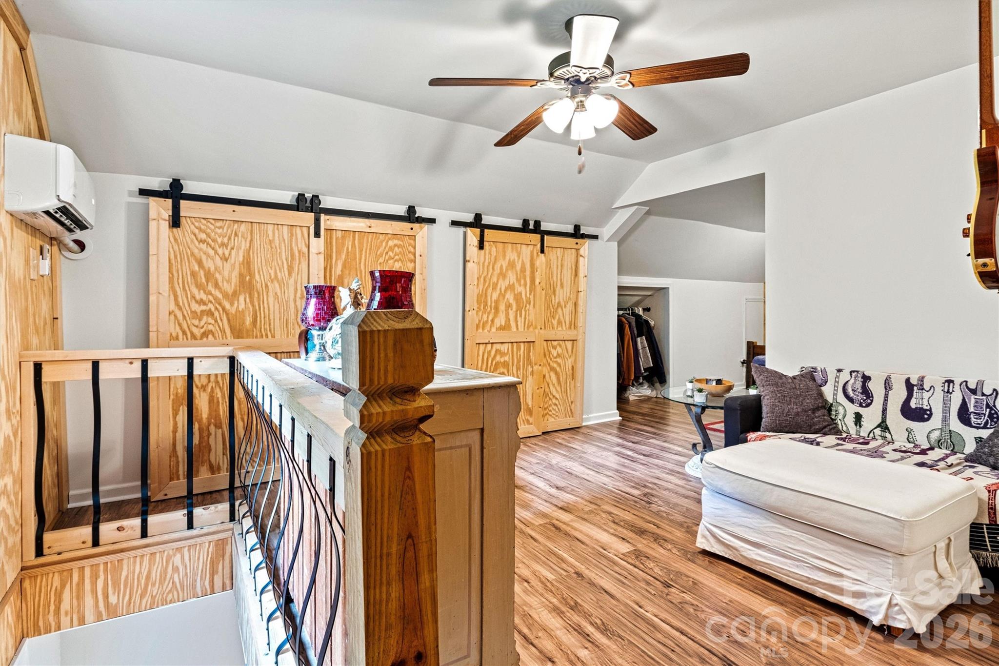large loft bedroom upstairs complete with sitting room and half bath ensuite - 6051 Pointe West Lane, Vale