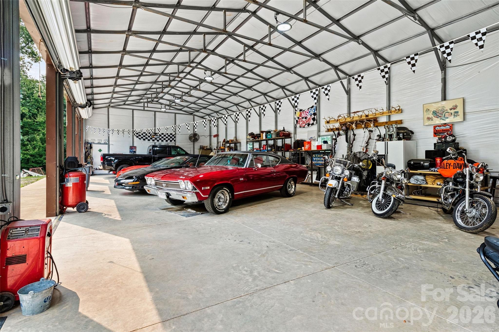 5 bay garage interior - 6051 Pointe West Lane, Vale