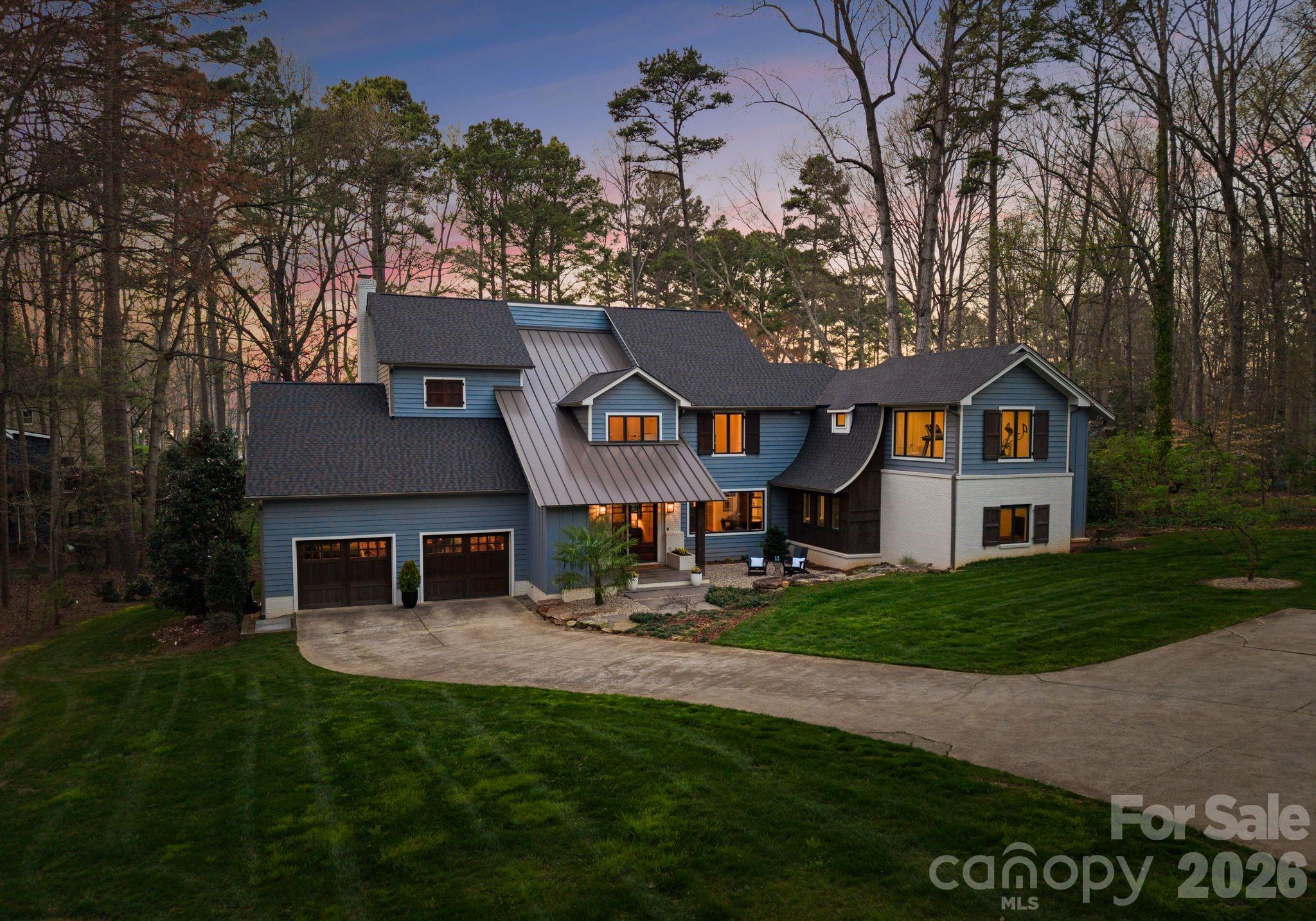 Front Elevation at Twilight - 16208 Weatherly Way, Huntersville
