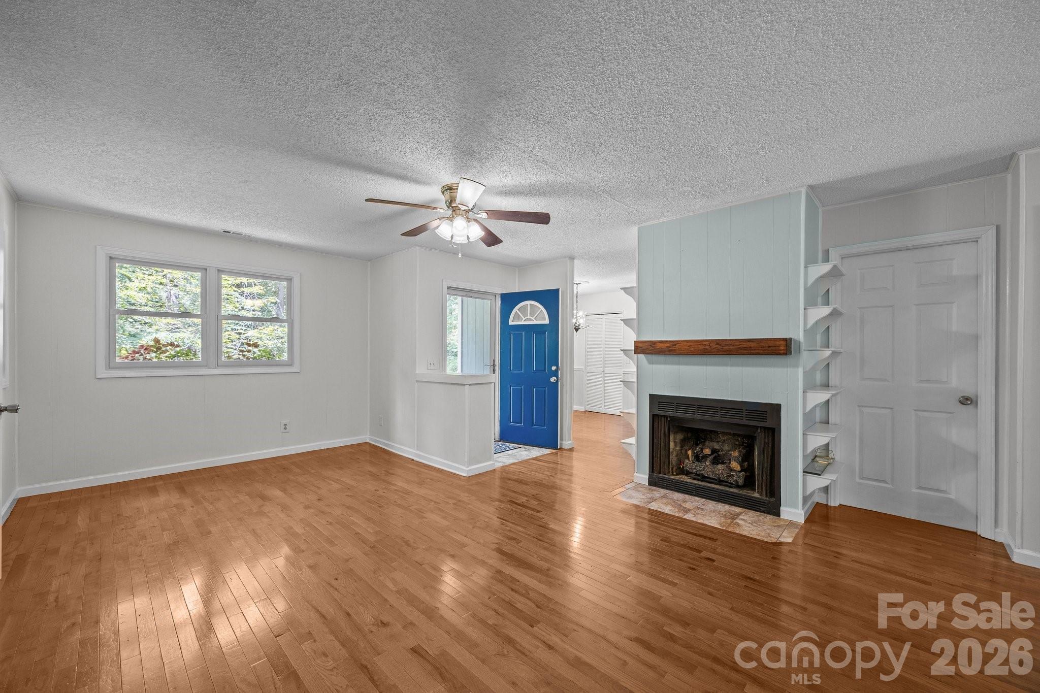 Living Room with gas fireplace - 193 Timberside Drive, Mars Hill