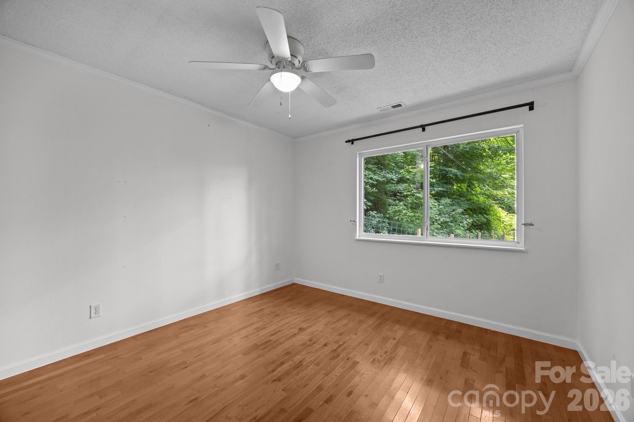 Bedroom with view of back yard - 193 Timberside Drive, Mars Hill