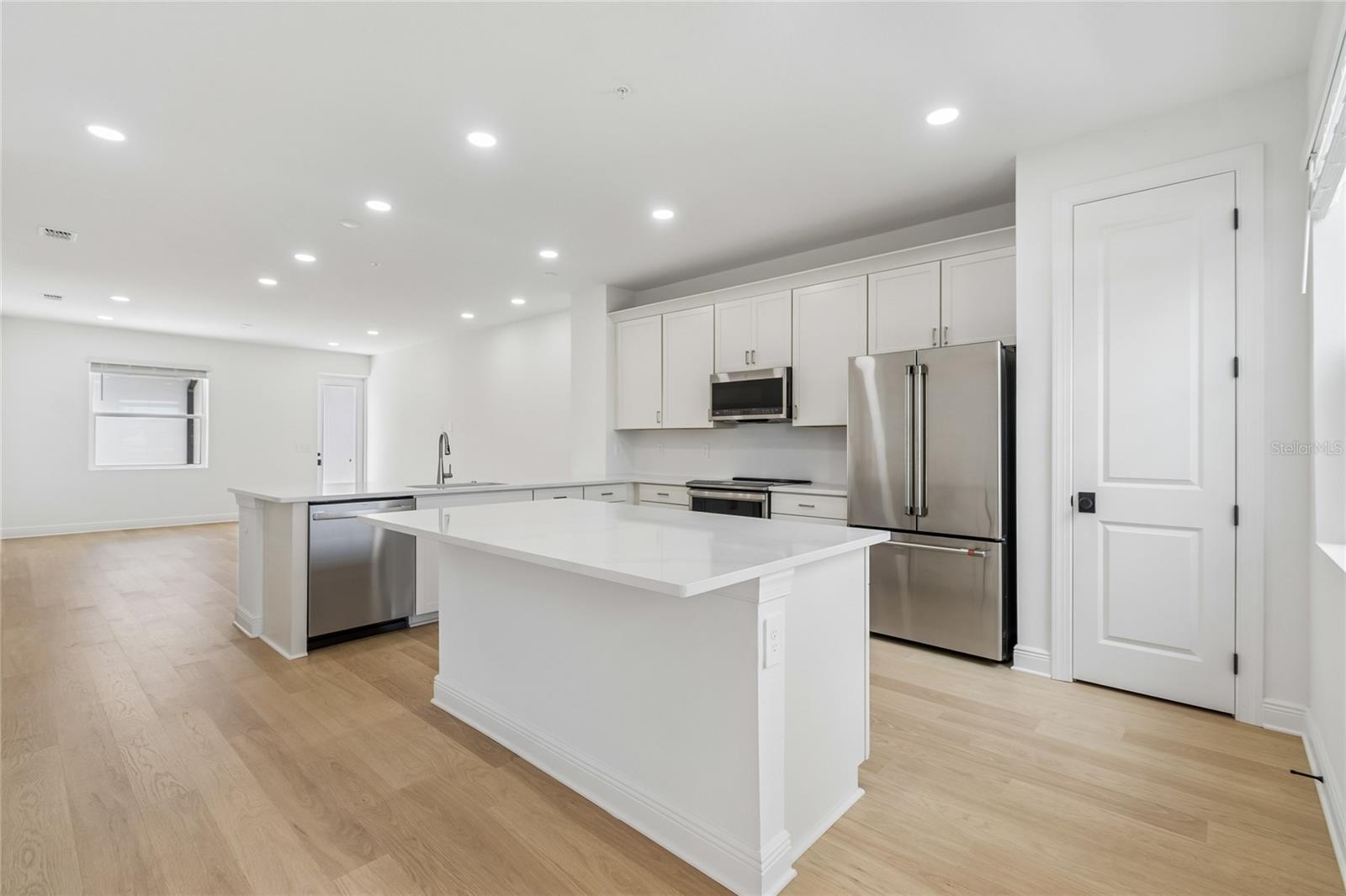 Kitchen-Photo description represents the model home of same floor plan. - 17736 BROADLEAF LOOP, VENICE