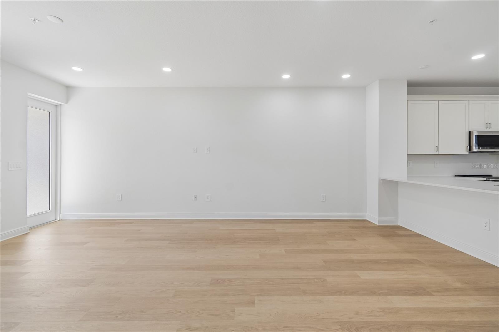 Great Room-Photo description represents the model home of same floor plan. - 17736 BROADLEAF LOOP, VENICE