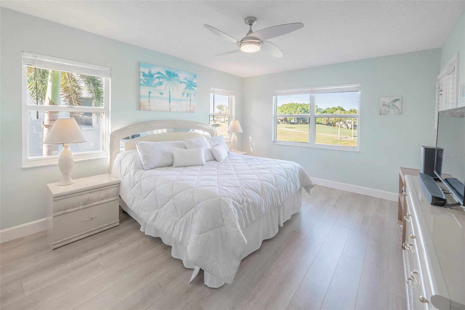 Primary bedroom with view of the golf course and of the water. - 425 CERROMAR TER #459, VENICE