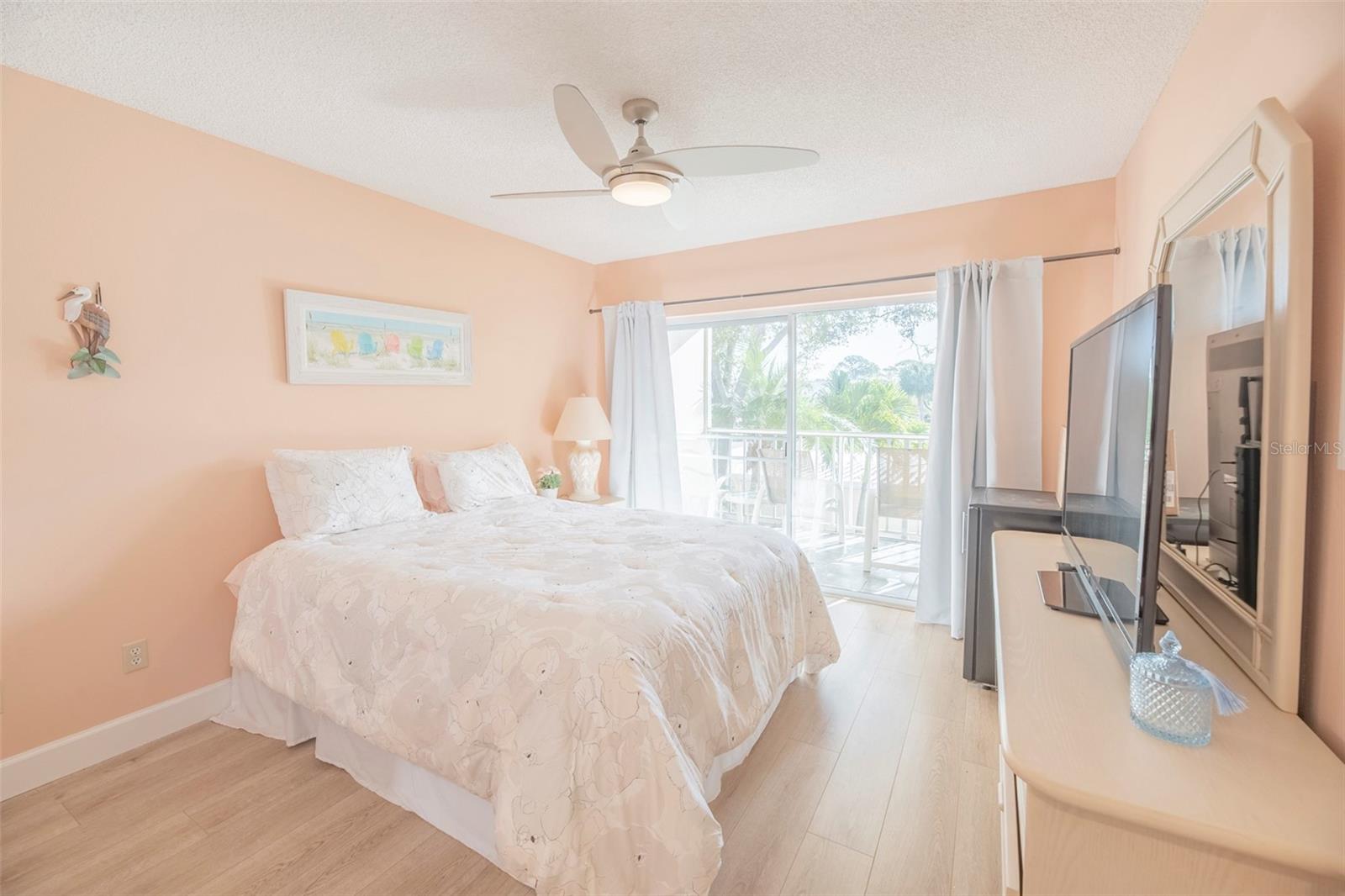 Second bedroom or guest room with private balcony. - 425 CERROMAR TER #459, VENICE