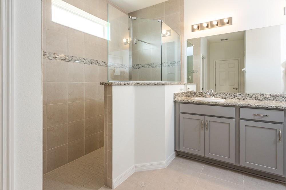 Primary bathroom with shower - 10 FISCHER LN, PALM COAST